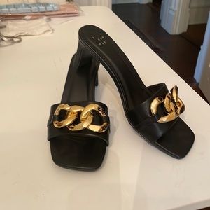 Black mules, size 10